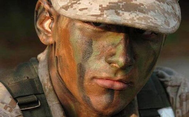 Soldier with Camouflage Paint
