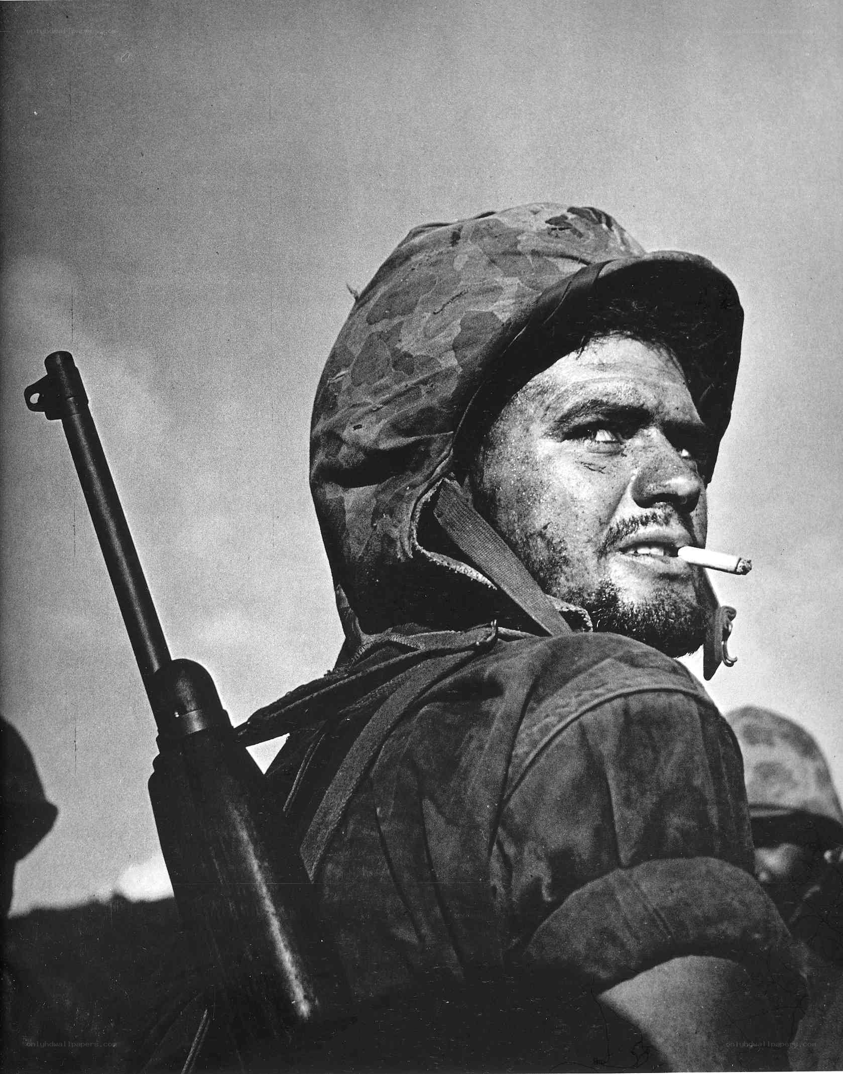 Soldier with cigarette on battlefield