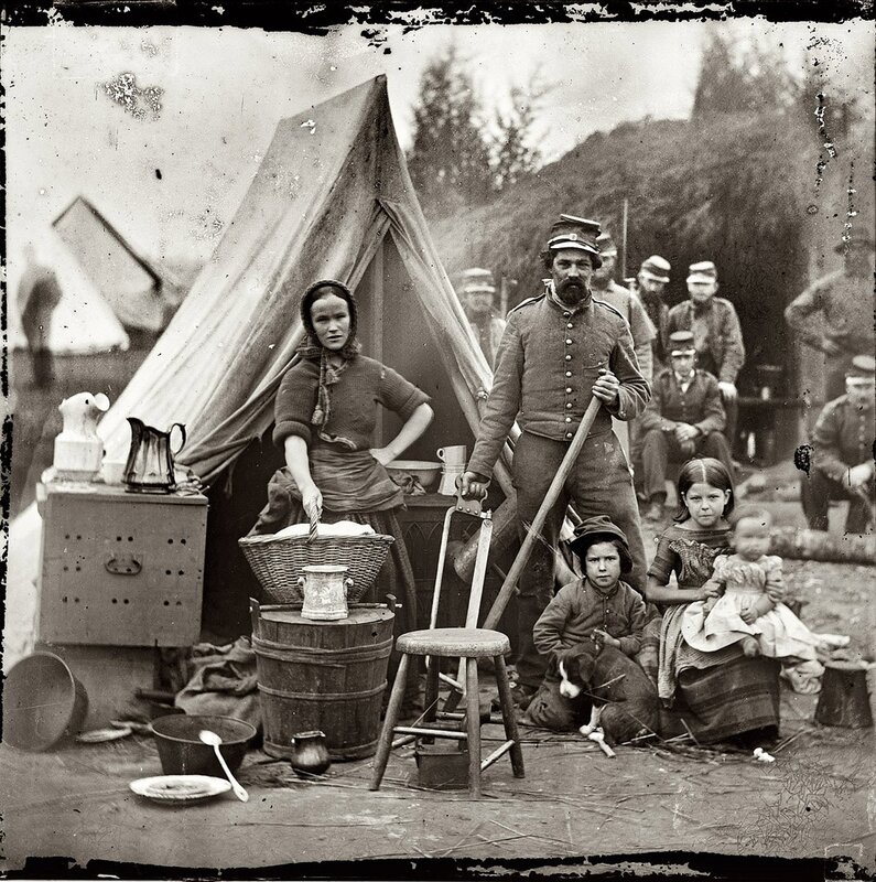 Soldier with family at camp