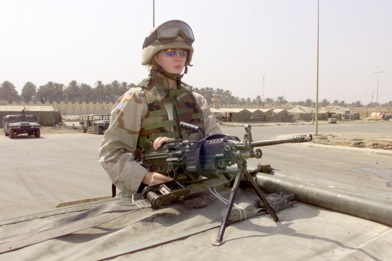 Soldier with machine gun at base
