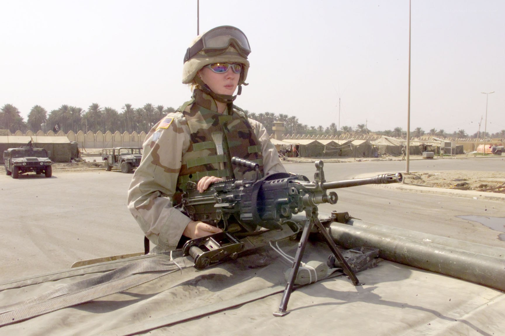 Soldier with machine gun at base