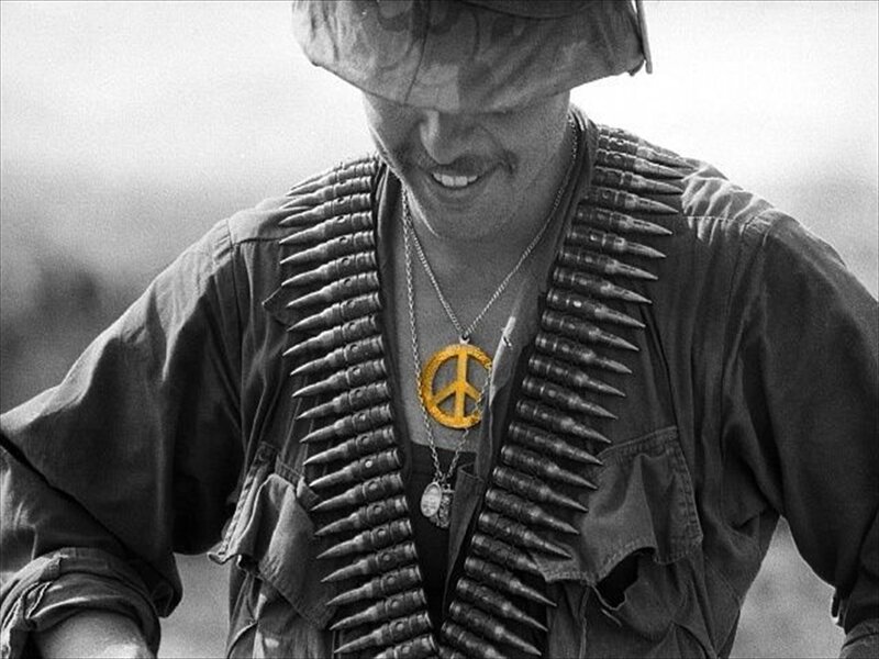 Soldier with peace sign necklace