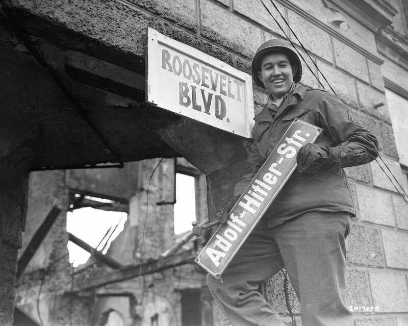 Soldier with renamed street sign