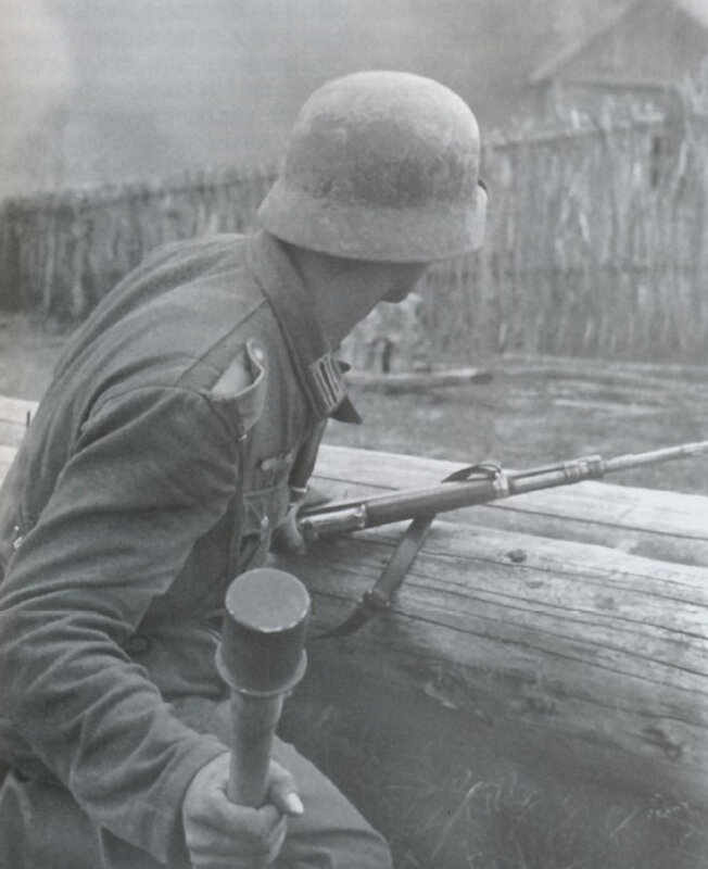 Soldier with rifle and grenade