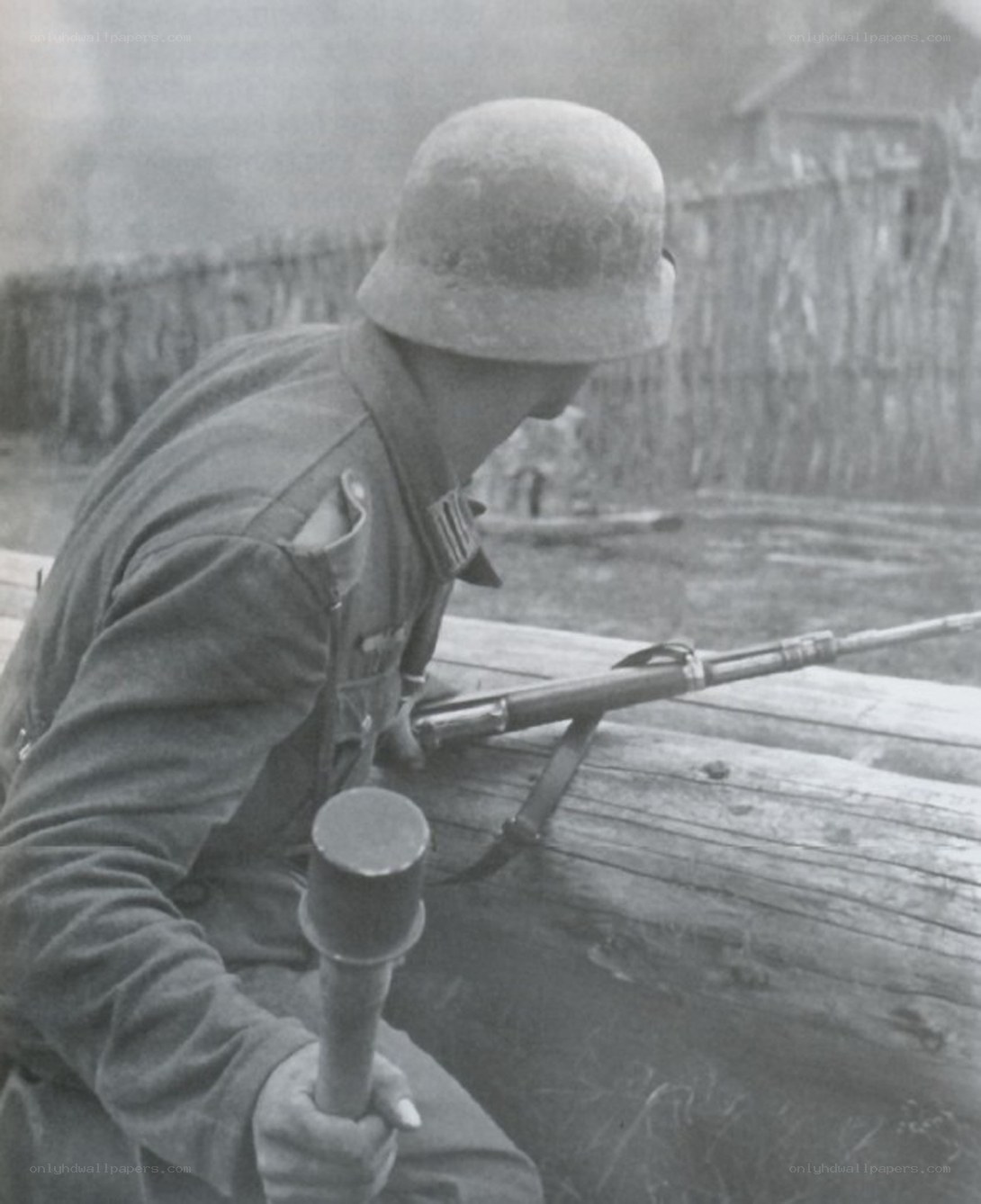 Soldier with rifle and grenade