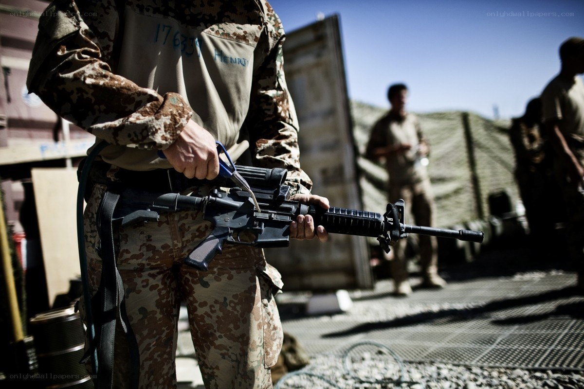 Soldier with rifle at base
