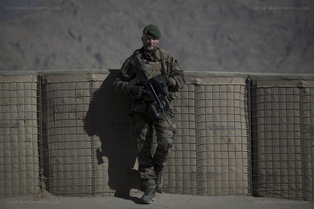 Soldier with rifle at checkpoint