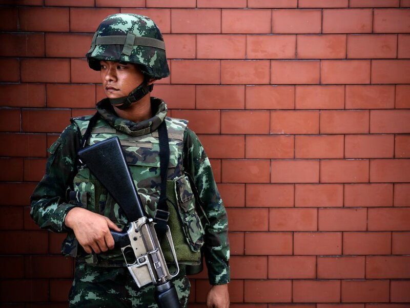 Soldier with Rifle — Green, Serious, Photograph