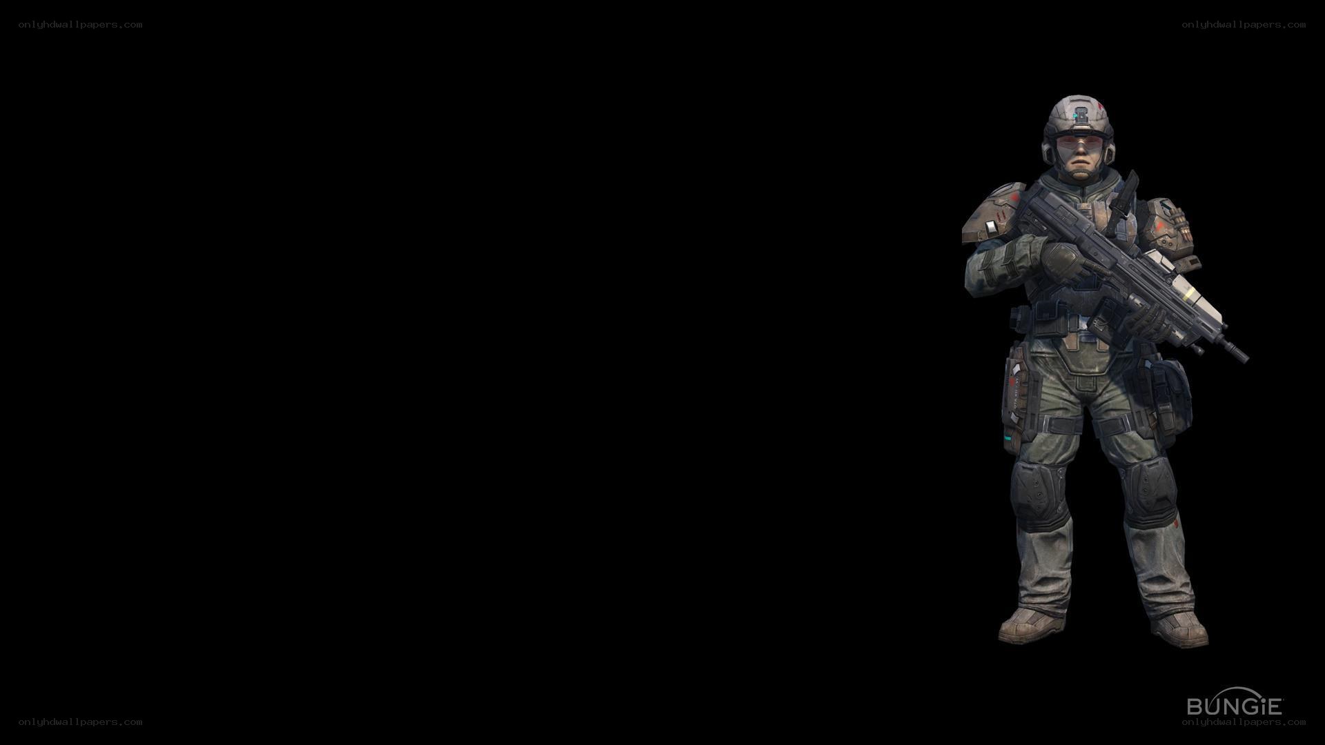 soldier with rifle in dark background