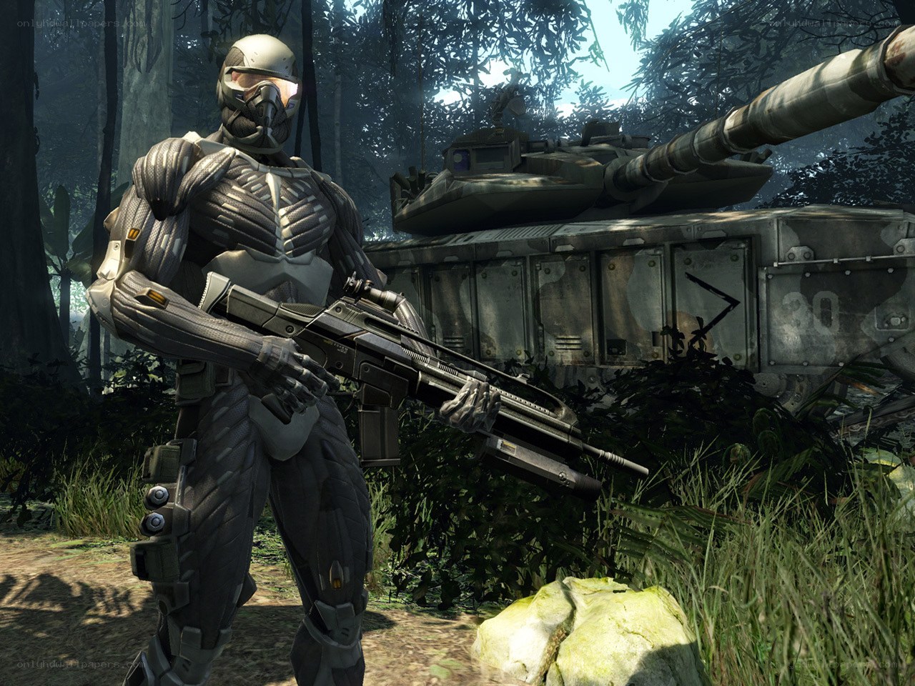 Soldier with rifle in forest