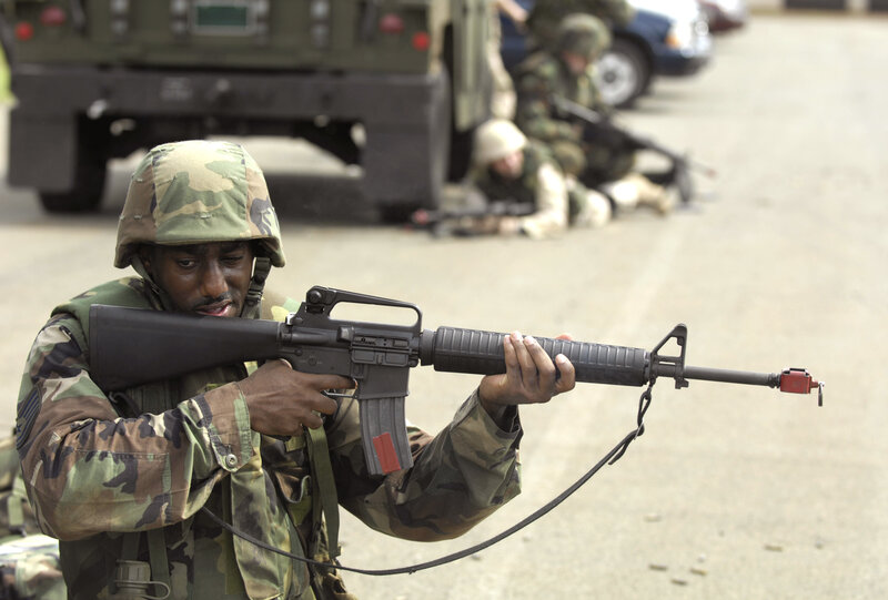 Soldier with rifle in training