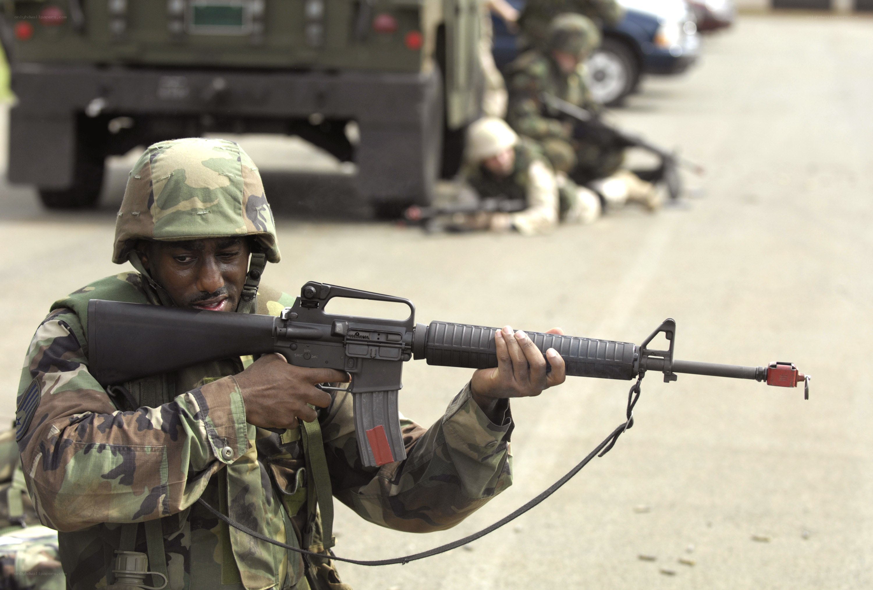 Soldier with rifle in training