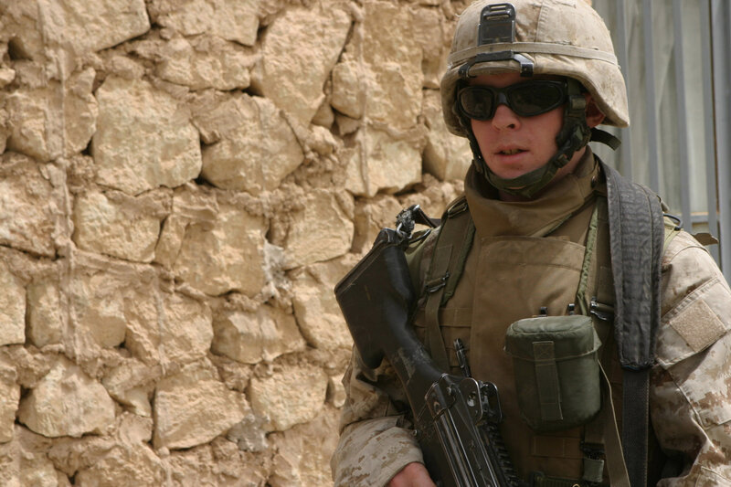 Soldier with Rifle — Tan, Alert, Afternoon, Photograph, Helmet