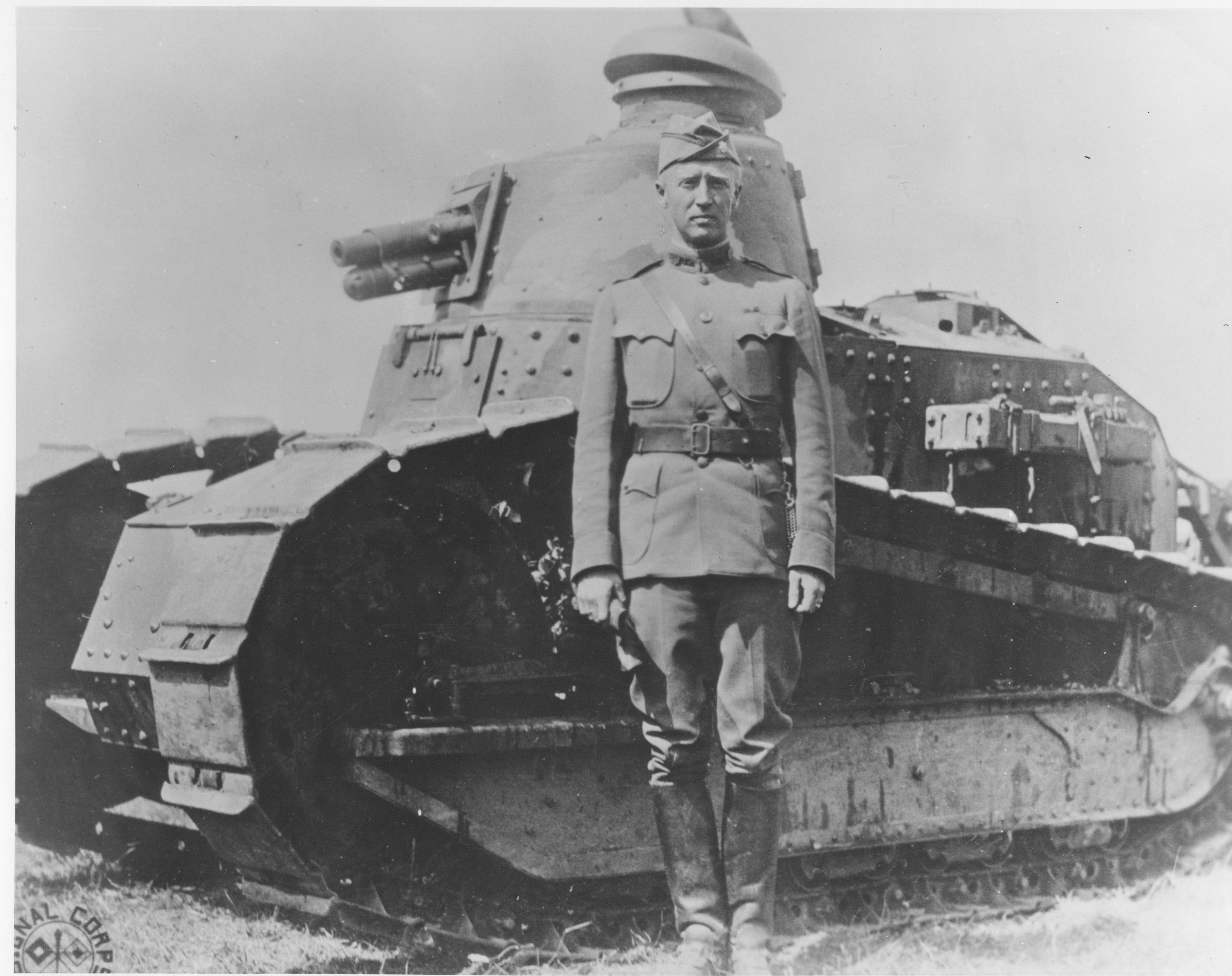 Soldier with tank in field