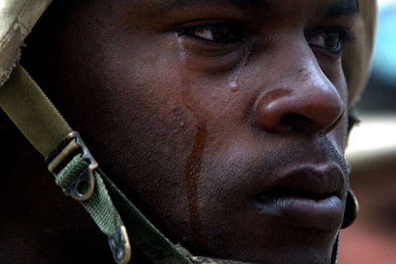 soldier with tear on face