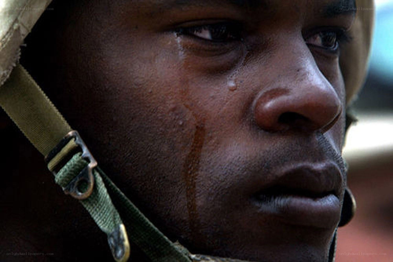 soldier with tear on face