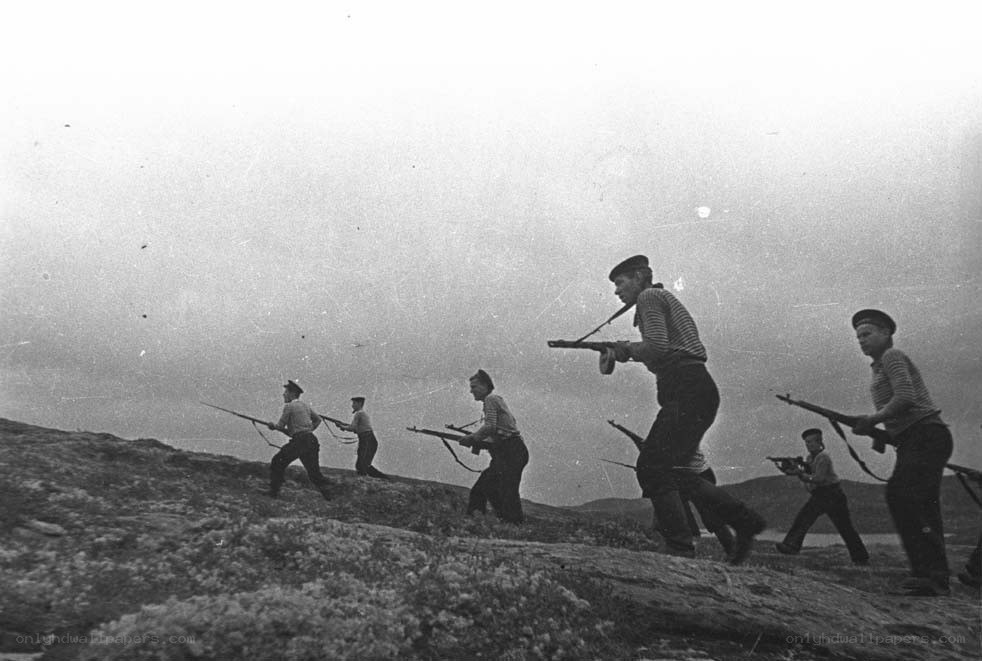 Soldiers advancing on a hill