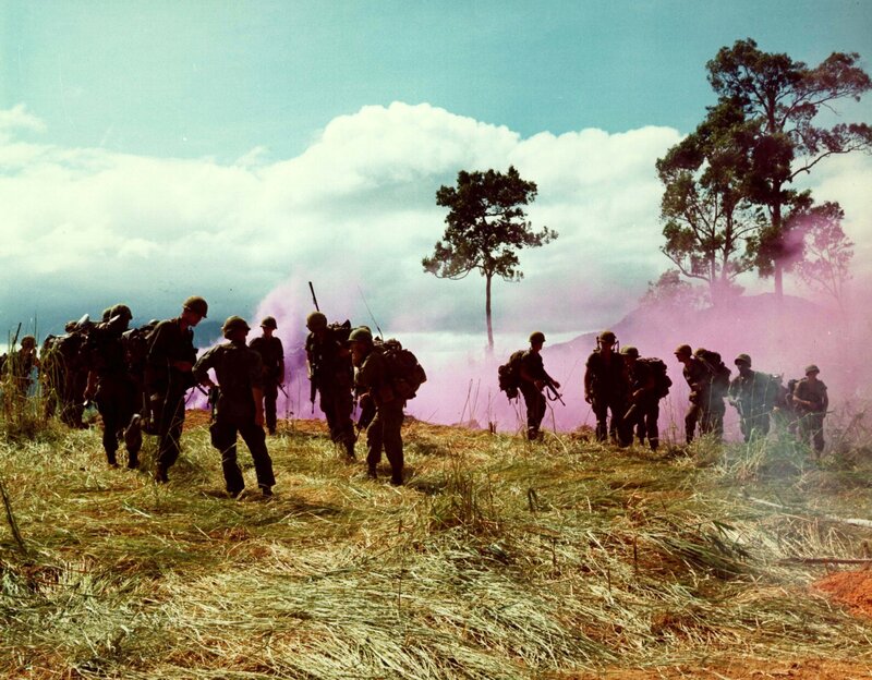 Soldiers advancing through smoke