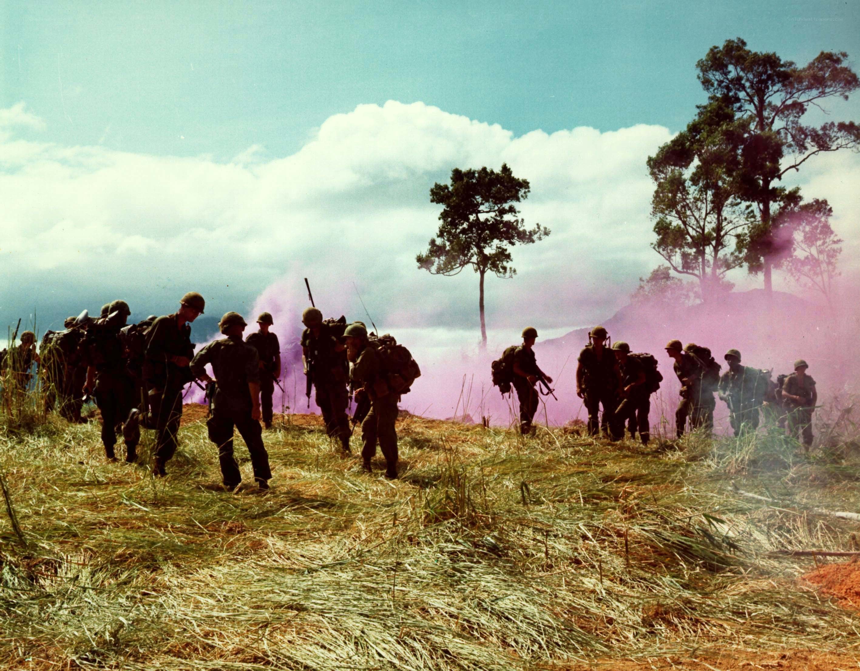 Soldiers advancing through smoke