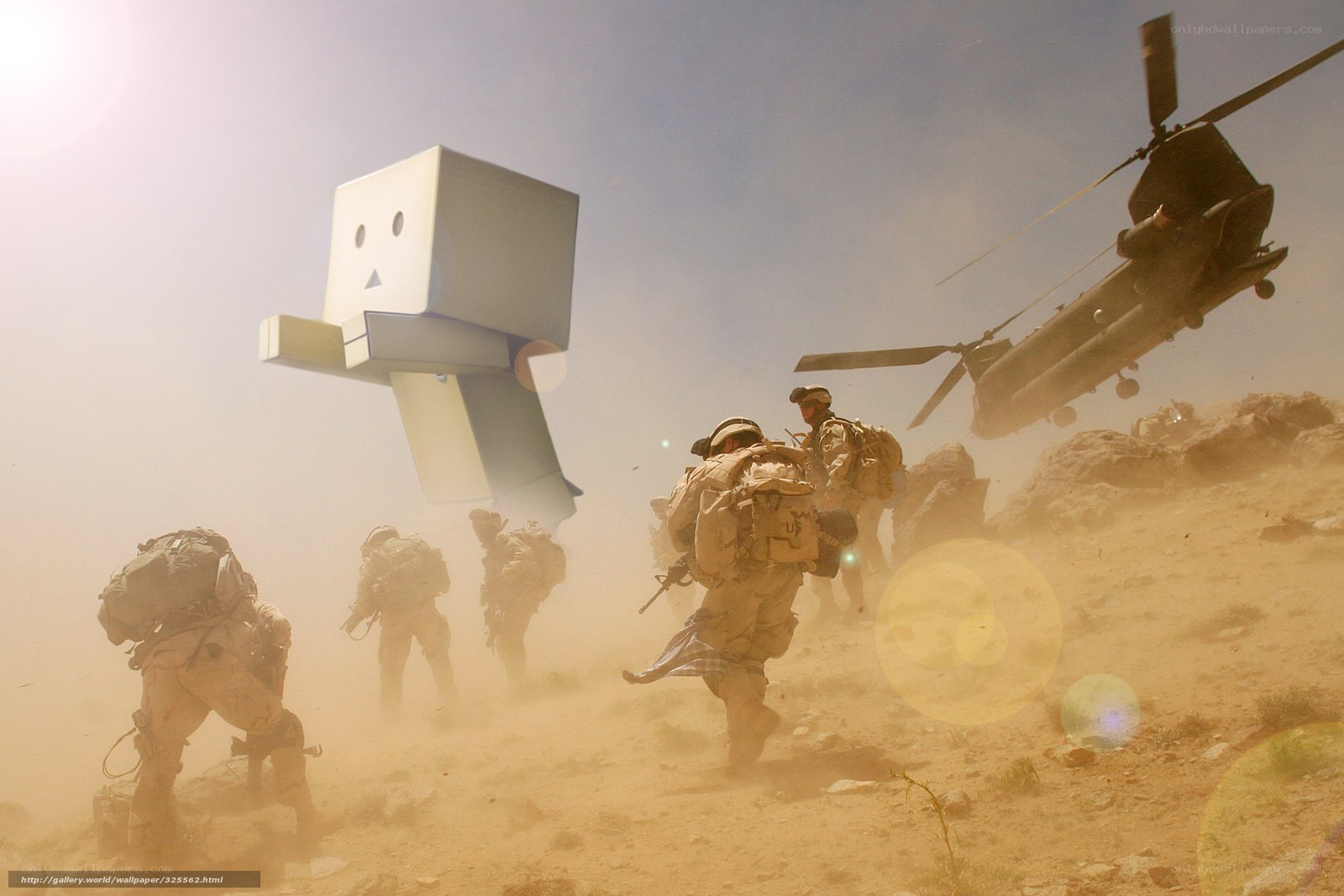 Soldiers and a robot in a desert