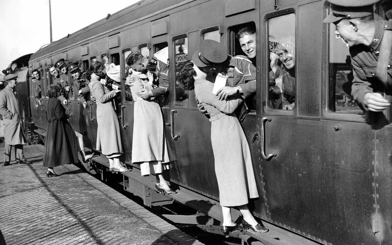 Soldiers and Women Hugging