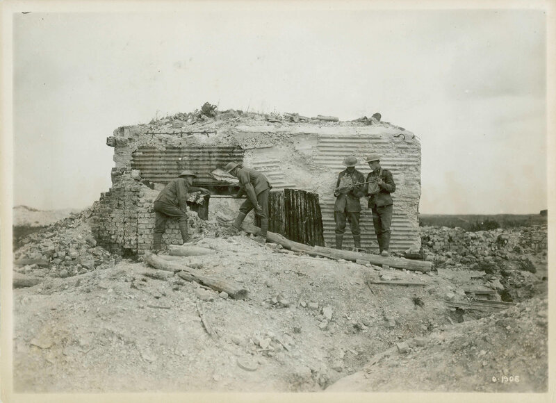 Soldiers at a ruined bunker