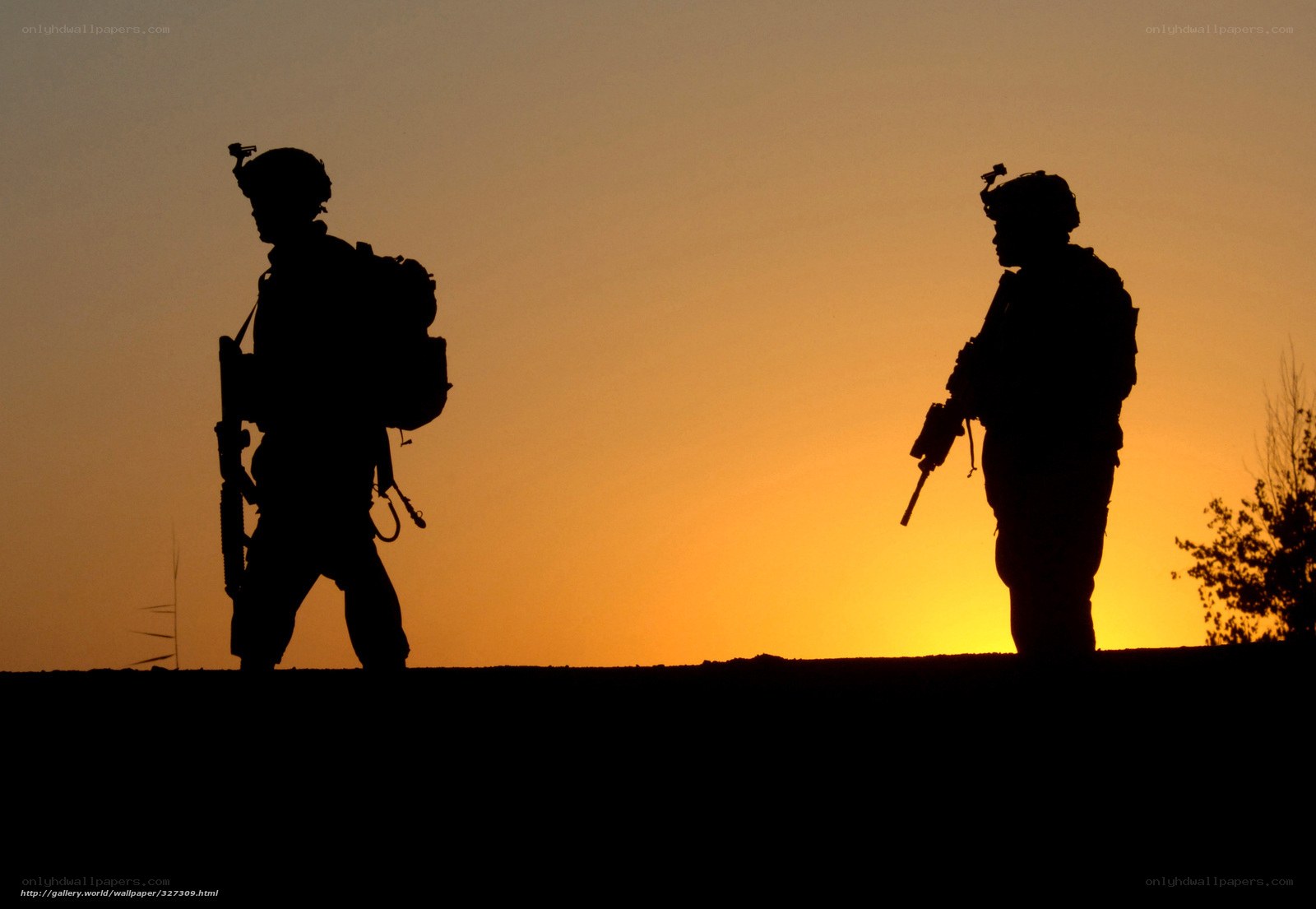 Soldiers at sunset silhouette