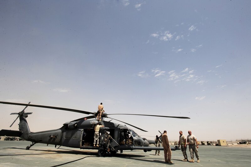 Soldiers boarding a helicopter