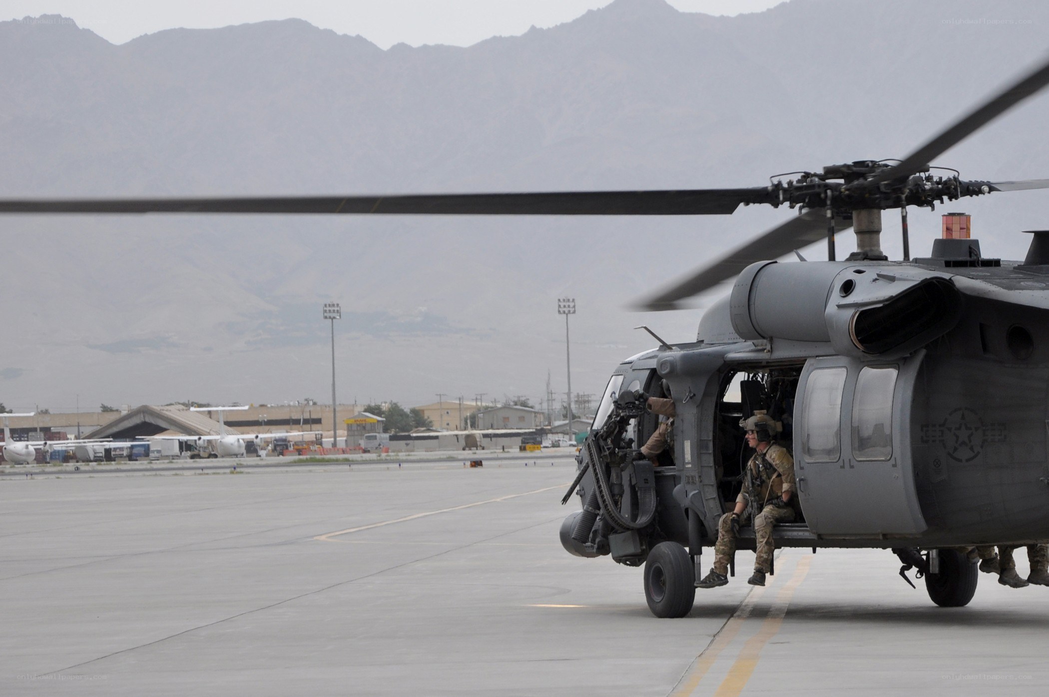 Soldiers boarding a helicopter
