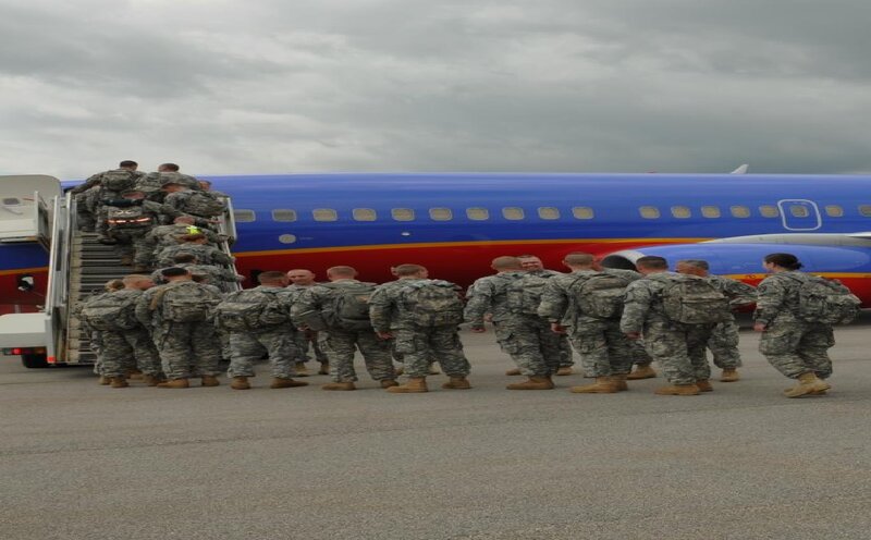 Soldiers Boarding Airplane
