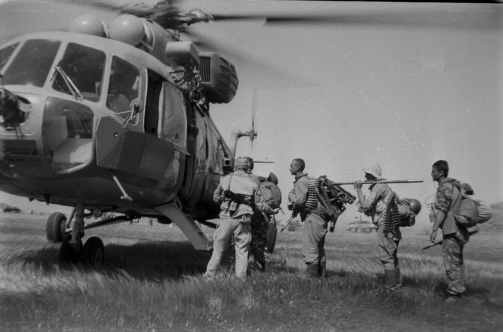Soldiers boarding helicopter