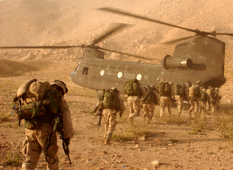 Soldiers Boarding Helicopter — Brown, Dramatic
