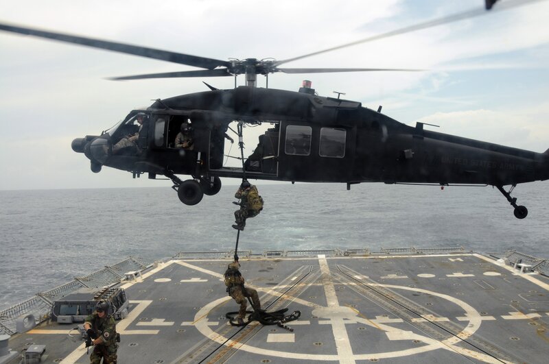 Soldiers Boarding Helicopter — Gray