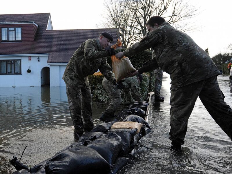 Soldiers Building Sandbag Wall