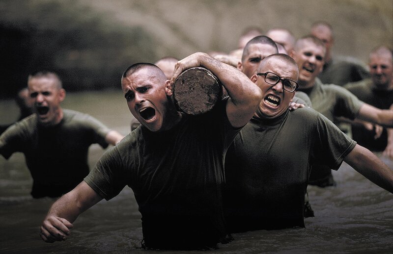 Soldiers Carrying Log