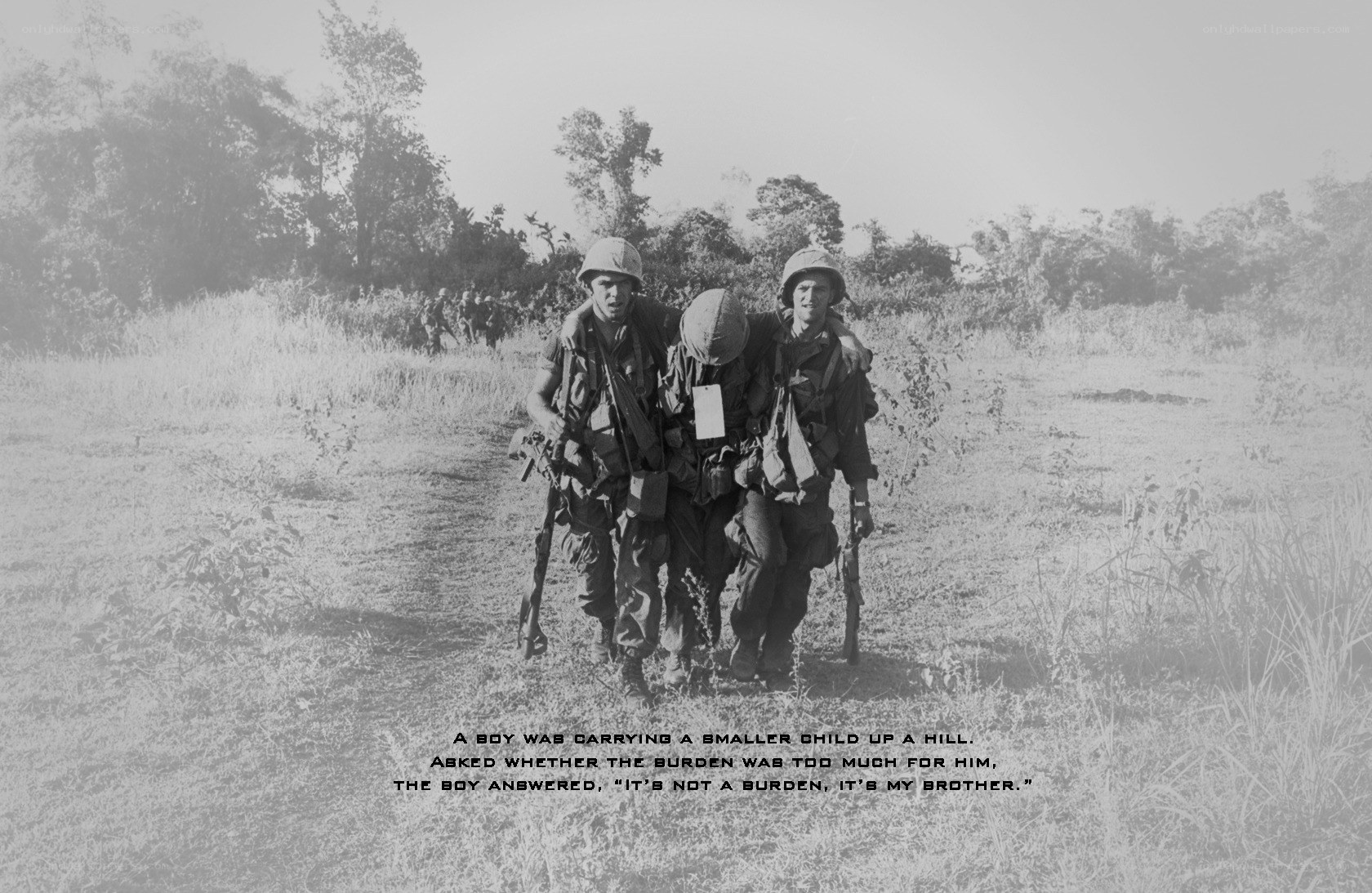 Soldiers carrying wounded comrade