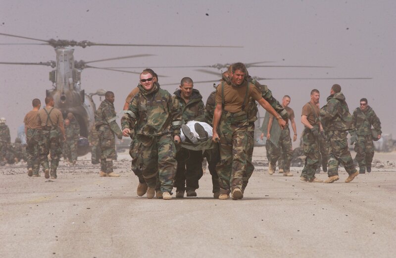 Soldiers carrying wounded comrade