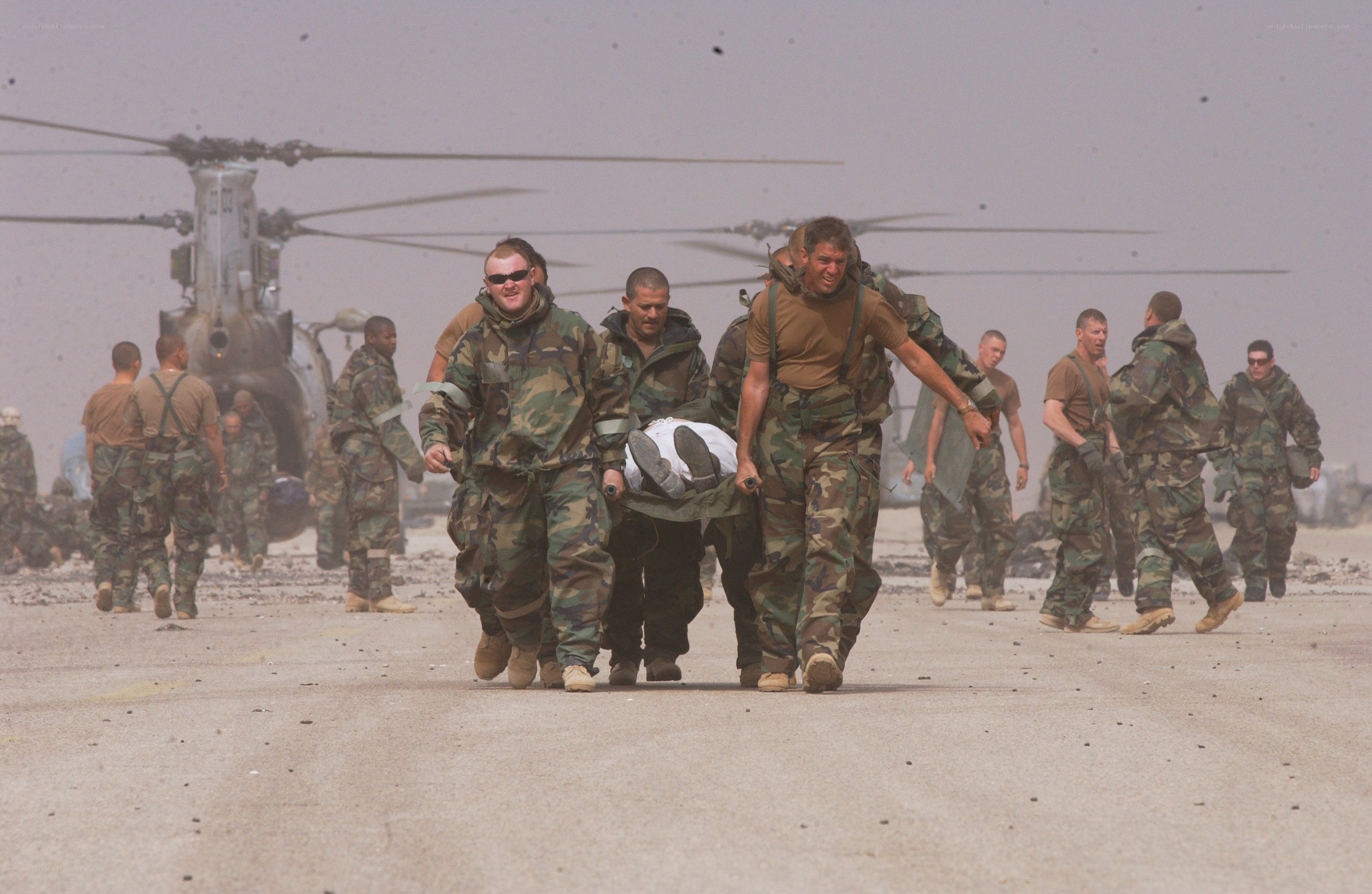 Soldiers carrying wounded comrade