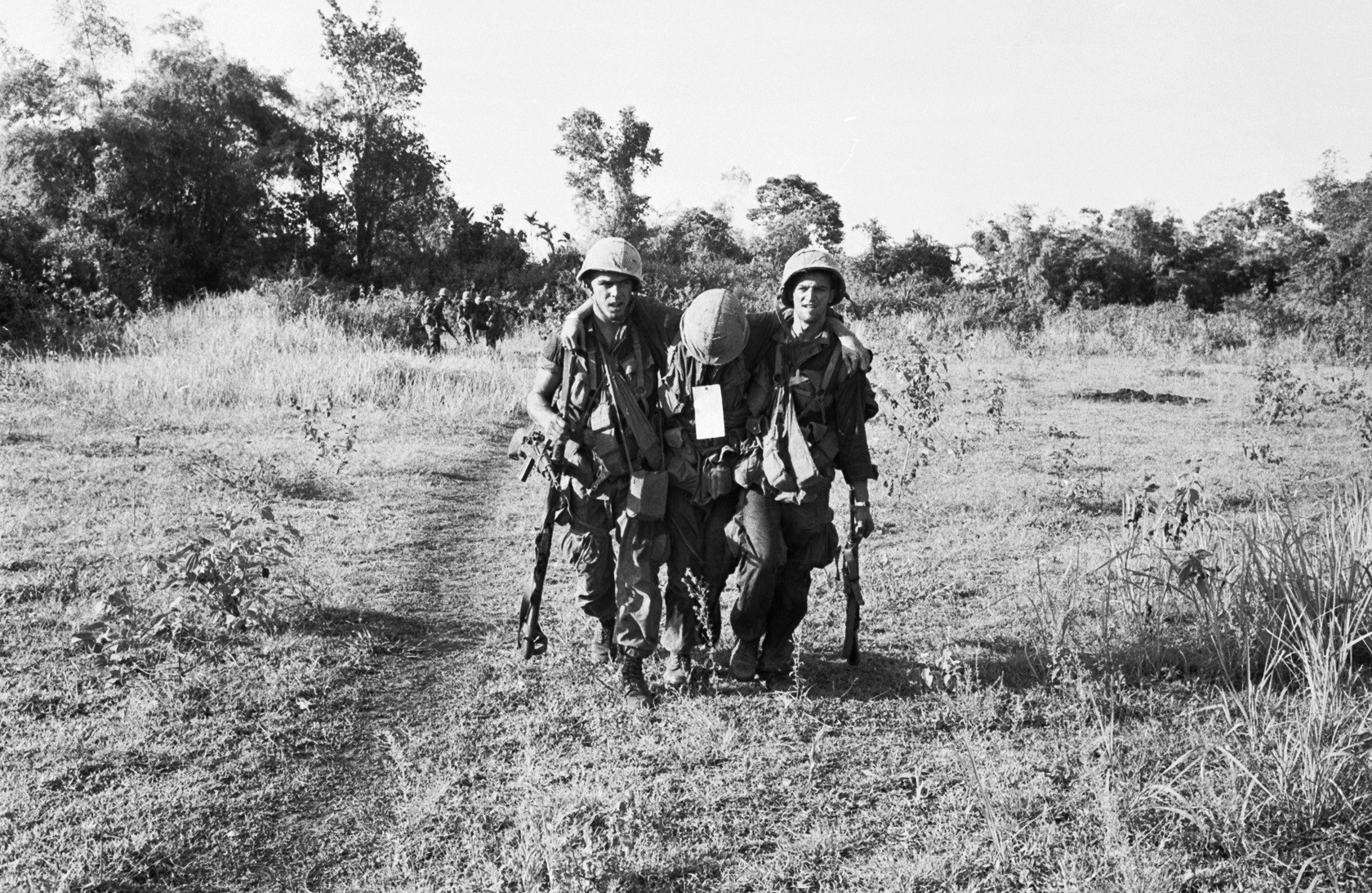 Soldiers carrying wounded comrade
