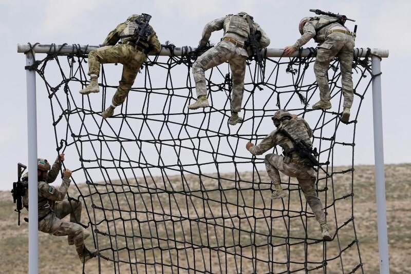 Soldiers Climbing Net