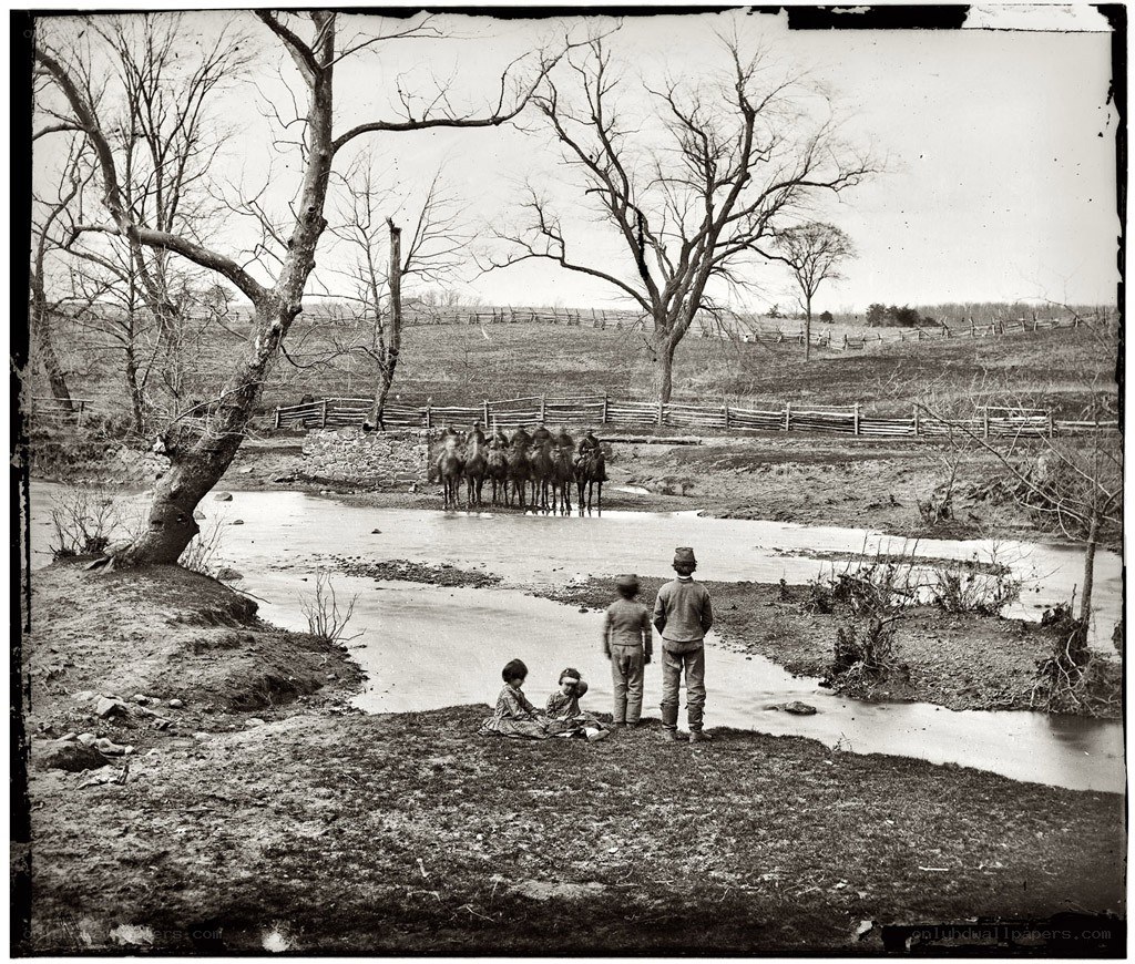 Soldiers crossing a river
