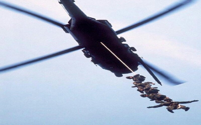 Soldiers Descending from Helicopter — Blue