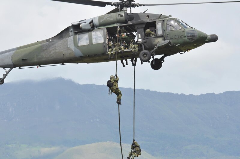 Soldiers Descending from Helicopter