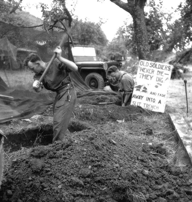 Soldiers digging a trench