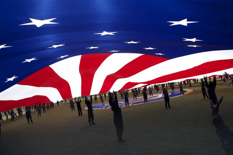 Soldiers Holding Flag — Blue