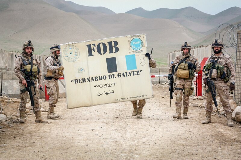 Soldiers Holding Sign