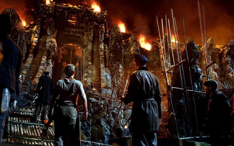 Soldiers in a burning ruin