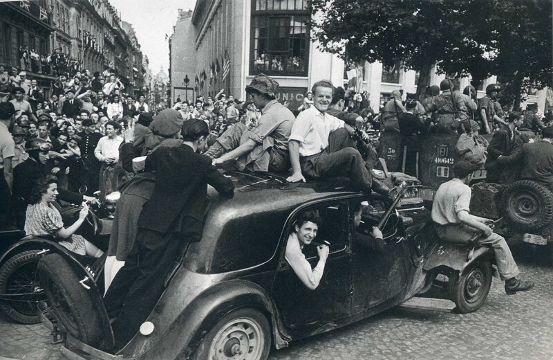 Soldiers in a car during liberation