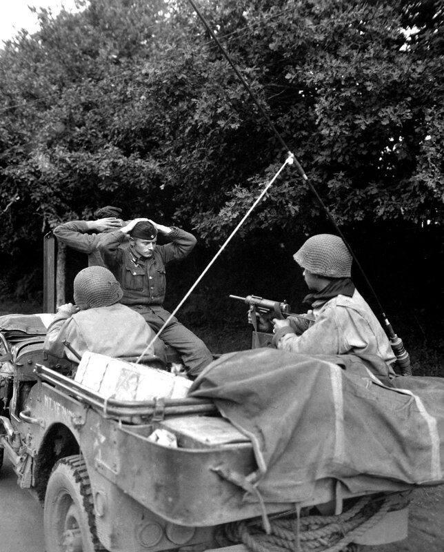 Soldiers in a military jeep