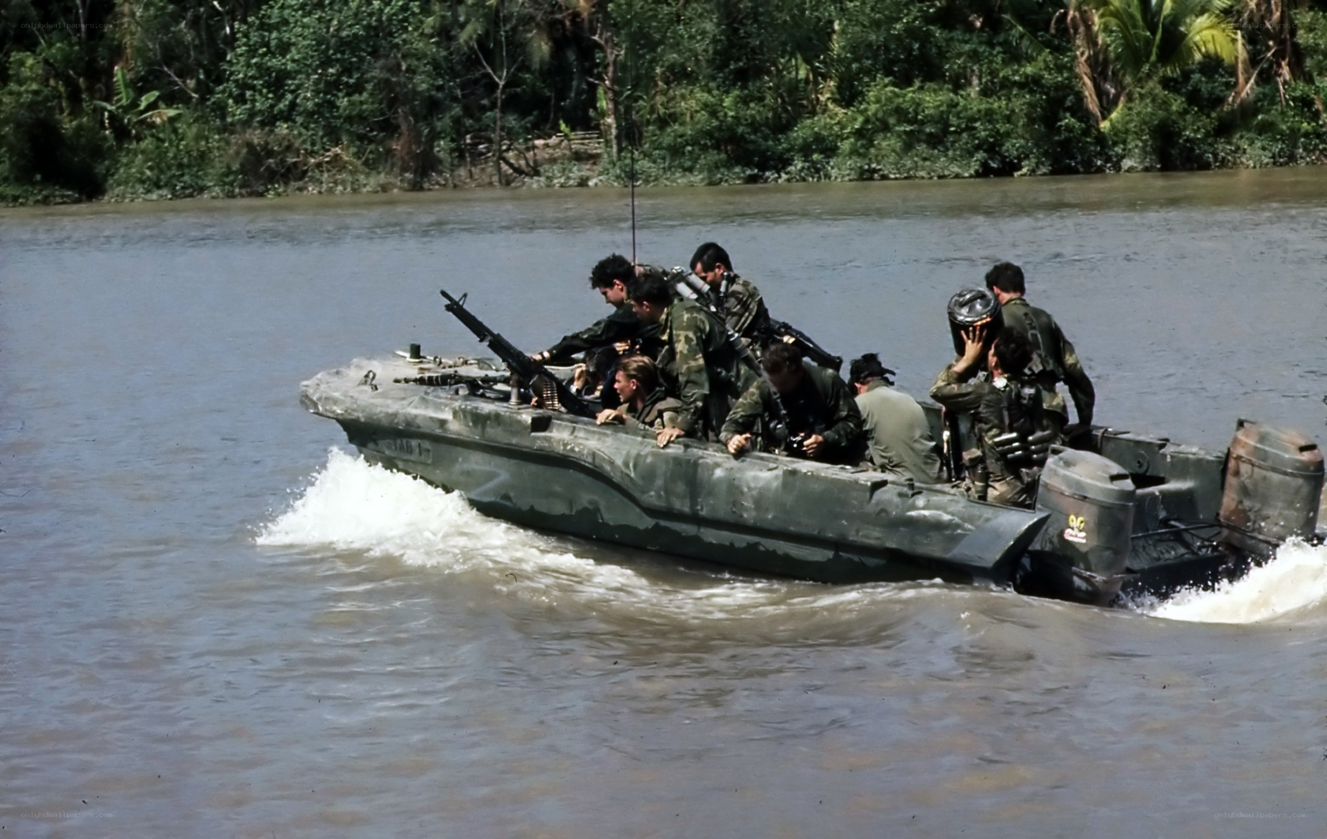 Soldiers in a river boat